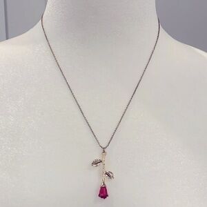 • Gold and red rose necklace